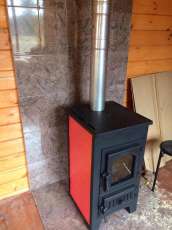 Купить стальной камин Везувий ПК-01 (270) в Слуцке фото в интерьере в Слуцке