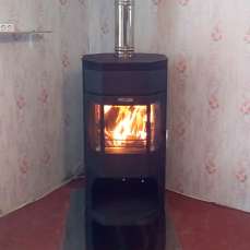 Недорогой камин с отделкой шамотом Сибирь 12 фото в интерьере в Слуцке