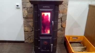 Стальная печь Термофор Статика Тетра, чёрная бронза фото в интерьере в Слуцке