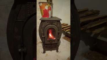 Печь отопительно-варочная чугунная "Сибирь" фото в интерьере в Слуцке