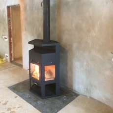 Купить недорогой камин с шамотом Мета-Бел Енисей в Слуцке фото в интерьере в Слуцке