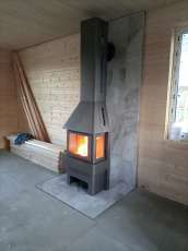 Недорогой камин Бавария со стеклами графит фото в интерьере в Слуцке