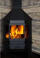 Печь-камин Бавария Мюнхен пристенно-угловой черный фото в интерьере в Слуцке