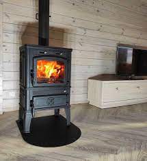 Печь-камин чугунный FireWay Dacha в интерьере чёрный Амазонка бай фото в Слуцке