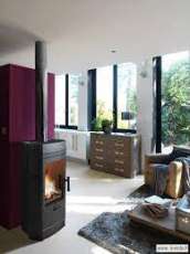 Печь-камин чугунный Invicta Gomont в интерьере Амазонка бай фото в Слуцке