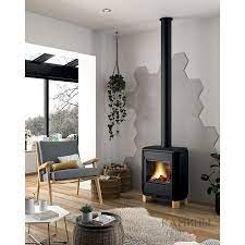 Печь-камин чугунный Invicta Carolo в интерьере Амазонка бай фото  в Слуцке