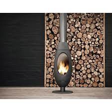 Печь-камин чугунный Invicta Ove в интерьере Амазонка бай фото в Слуцке