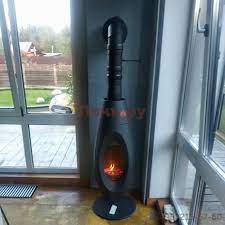 Печь-камин чугунный Invicta OVATIO в интерьере Амазонка бай фото в Слуцке